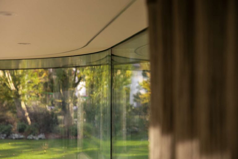 Alverre glazen gevel verbouwing villa